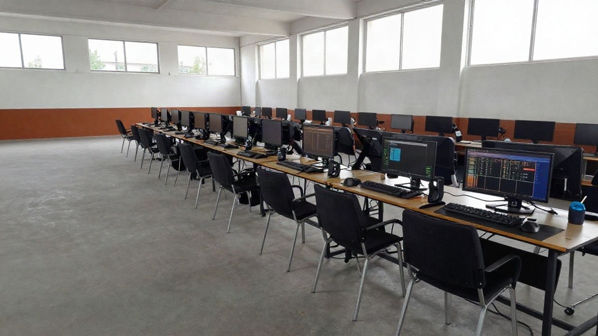 Illustrative image: sports hall with gaming stations and screens set up for a video game day