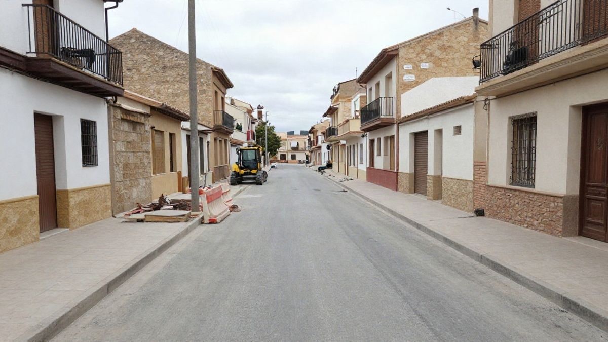 Imagen ilustrativa: calle urbana en obras con aceras en renovación y líneas que convergen en perspectiva